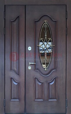 Темная металлическая дверь Винорит со стеклом и ковкой ДСК-239 в Архангельске